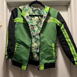 Never worn Disney Star Wars Baby Yoda reversible hooded rain jacket